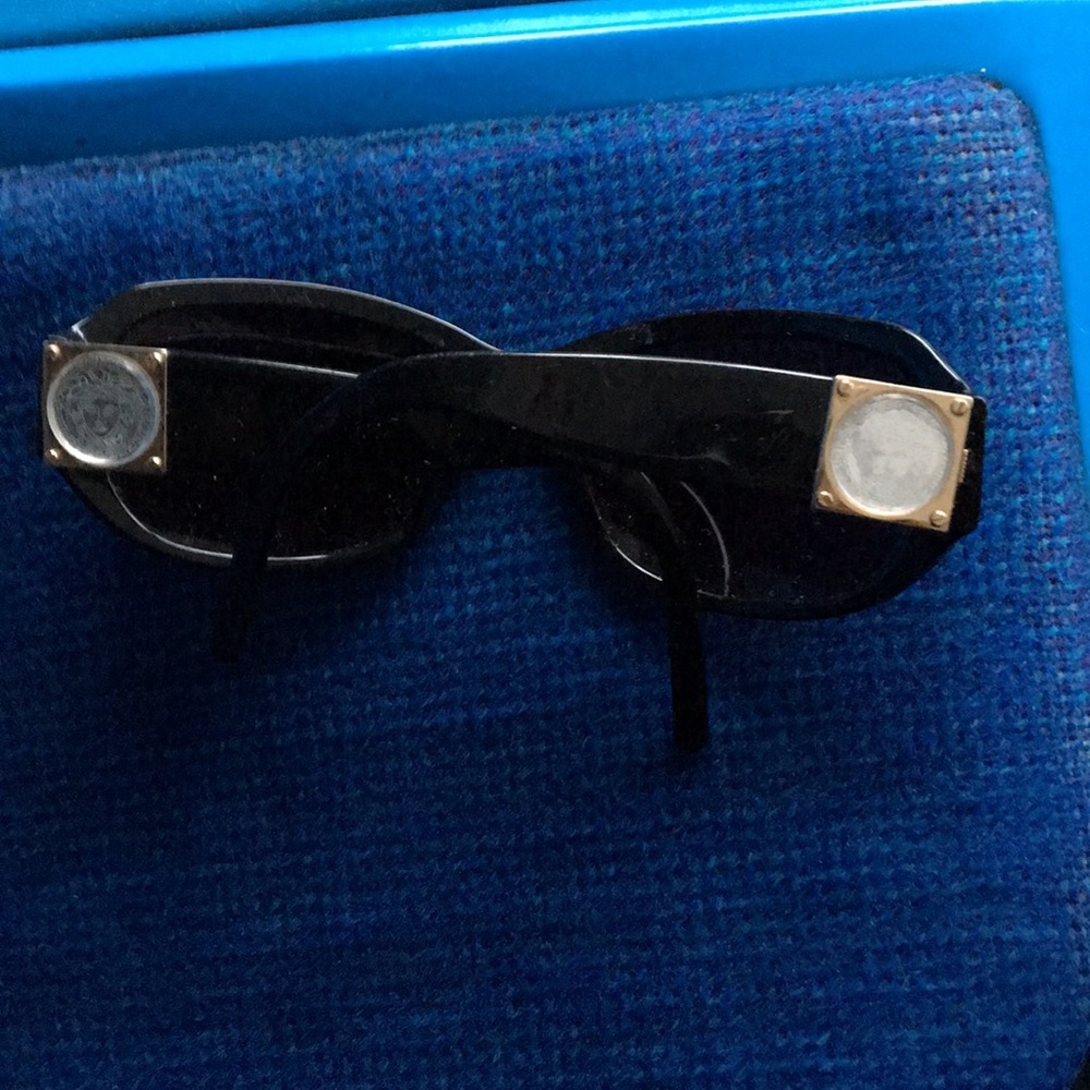 They are VERSACH made by ITALY CE .